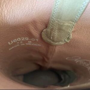 gray, slightly bedazzled cowboy boots size 7.5 worn once